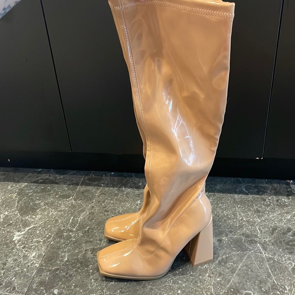 Tan mid calf shiny leather boots